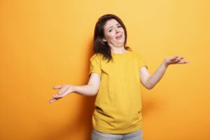 Woman standing with clueless expression didn't know